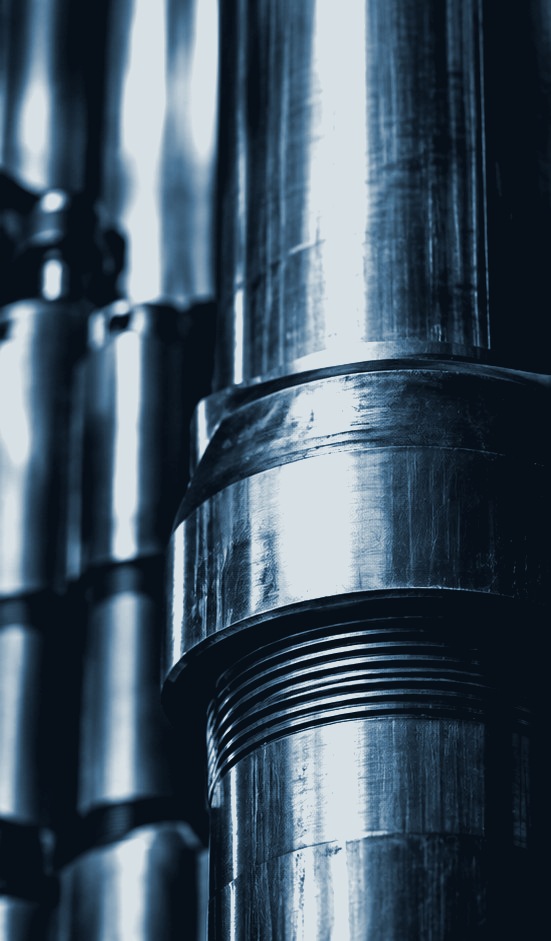Close-up of machined steel drilling equipment